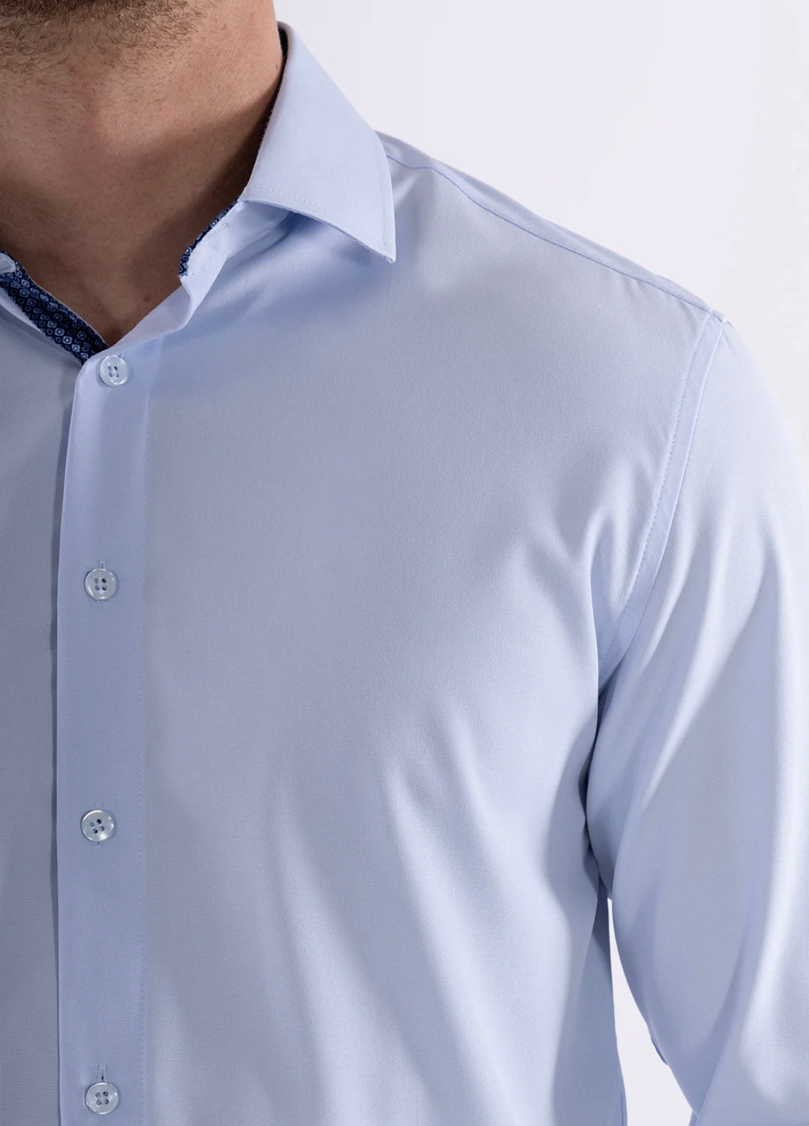 Bespoke Performance stretch fit long sleeve button up dress shirt. Sky blue